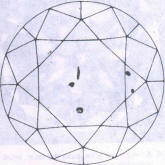 Fig 91 Several light inclusions under the table and table facets 