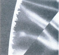 Cleavage cracks along the girdle (40 x) 