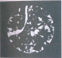 Fig 129 Large cleavage crack seen through the crown Fig 129 Large cleavage crack seen through the crown
