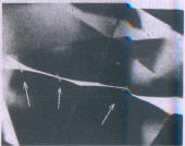 Fig 227 Knife-edged girdle with small cleavage cracks.