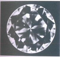 Fig 63 A minute light crystal under the table, crack-like fringes 