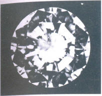 Fig 73 Several very small, light inclusions under the table Fig 73 Several very small, light inclusions under the table