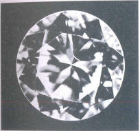 Fig 81 A cleavage crack in a pavilion main facet, seen through the crown Fig 81 A cleavage crack in a pavilion main facet, seen through the crown